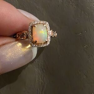 Elegant Opal and Diamond Ring